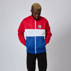 //merch.devolverdigital.co/cdn/shop/products/Trackie_Top_9---STORE_1024x1024.jpg?v=1659701389 DAC Track Top